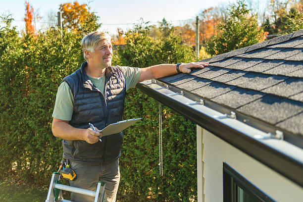 Professional Hail Damage Roof Repair technician working in Westborough, MA